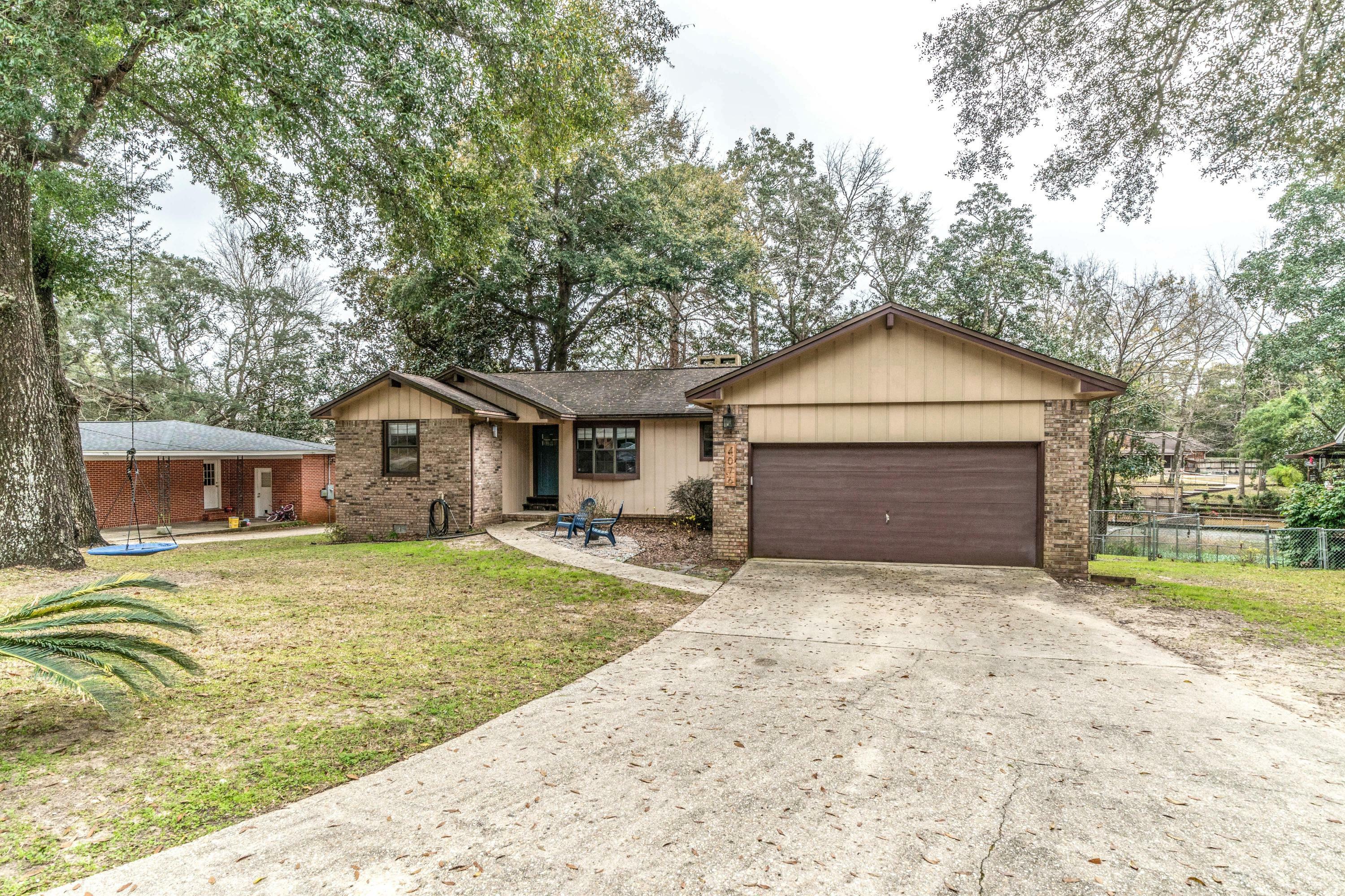 Property Photo:  4076 Rocky Drive  FL 32578 