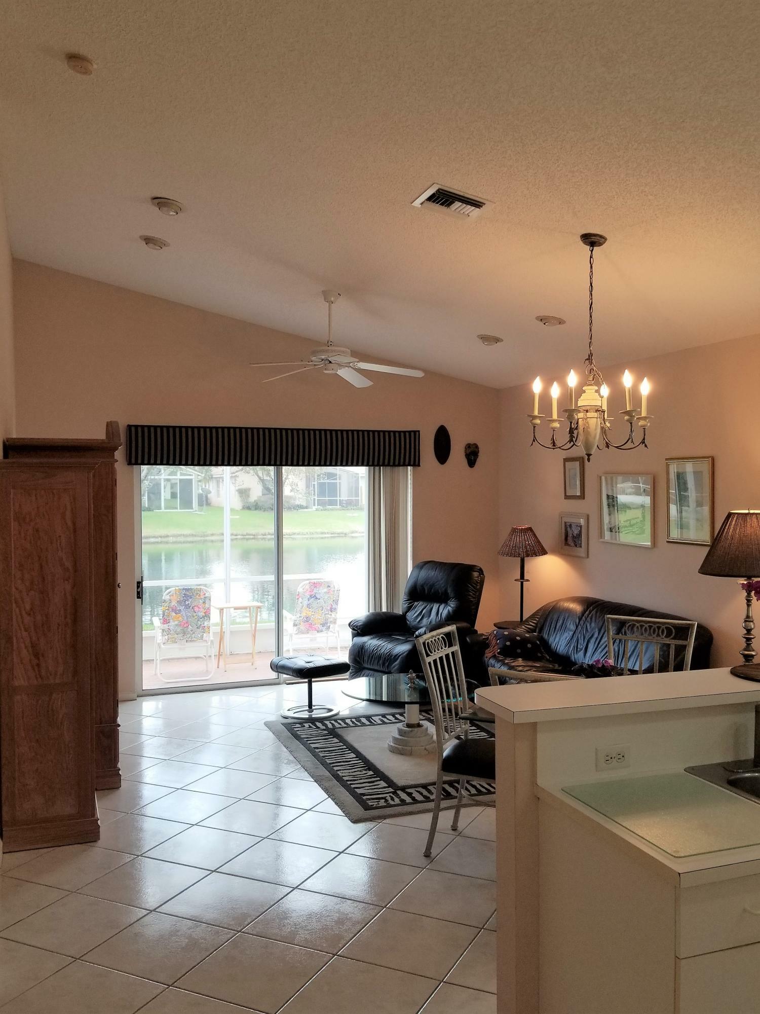 Property Photo:  7690 Cherry Blossom Way  FL 33437 