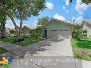 Property Photo:  5871 NW 40th Ln  FL 33073 