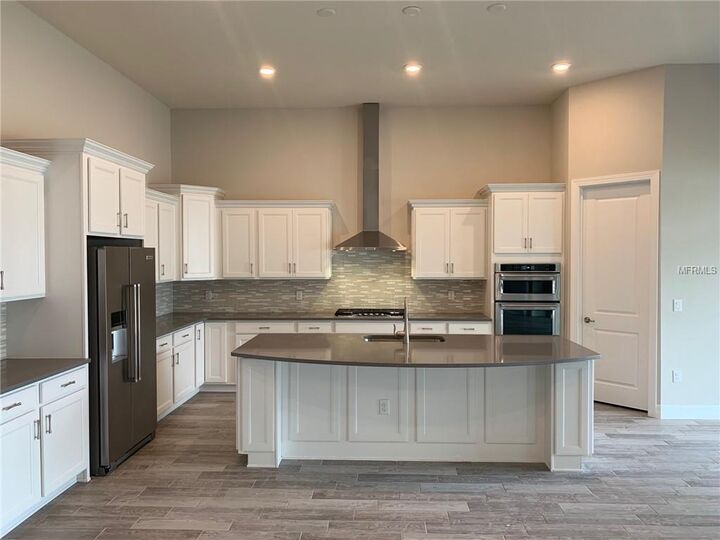 Property Photo:  7893 Wandering Way  FL 32836 