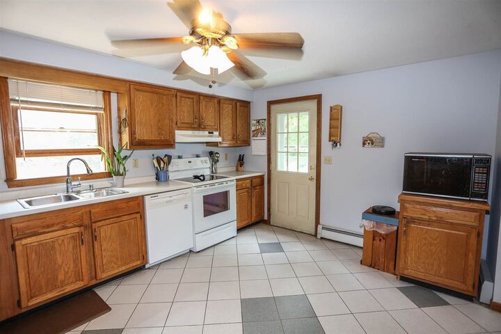 Property Photo: 4 Cedar Drive NH 03036