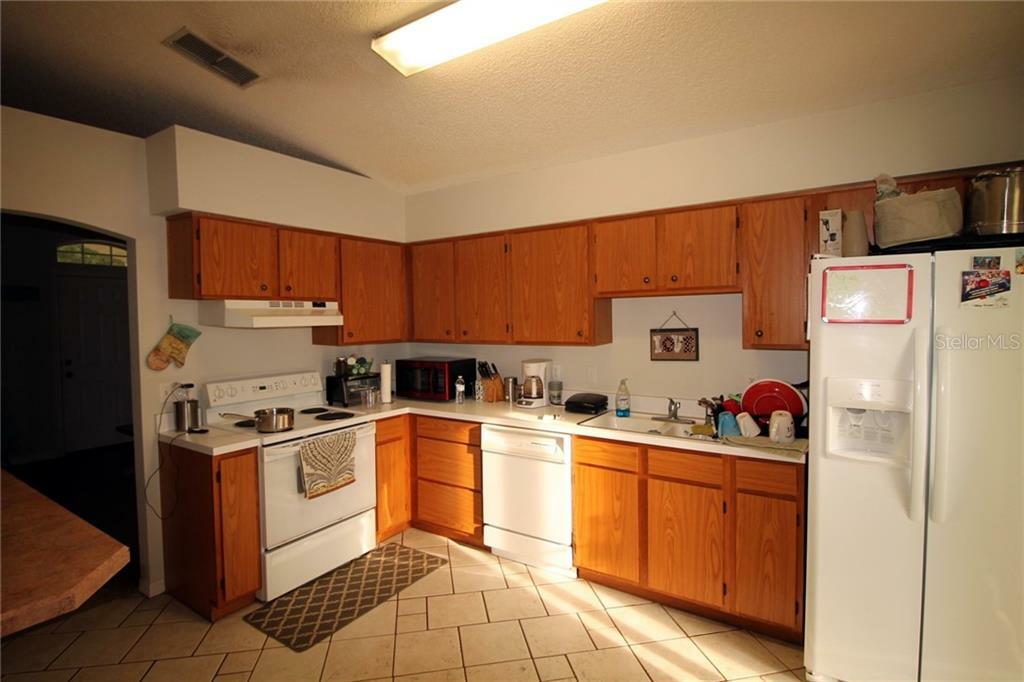 Property Photo:  12835 Eryn Boulevard  FL 34711 