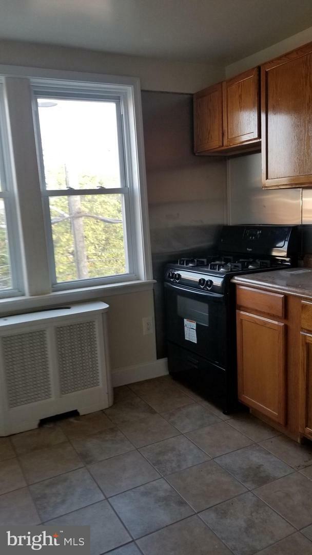 Property Photo:  7801 Provident Road  PA 19150 