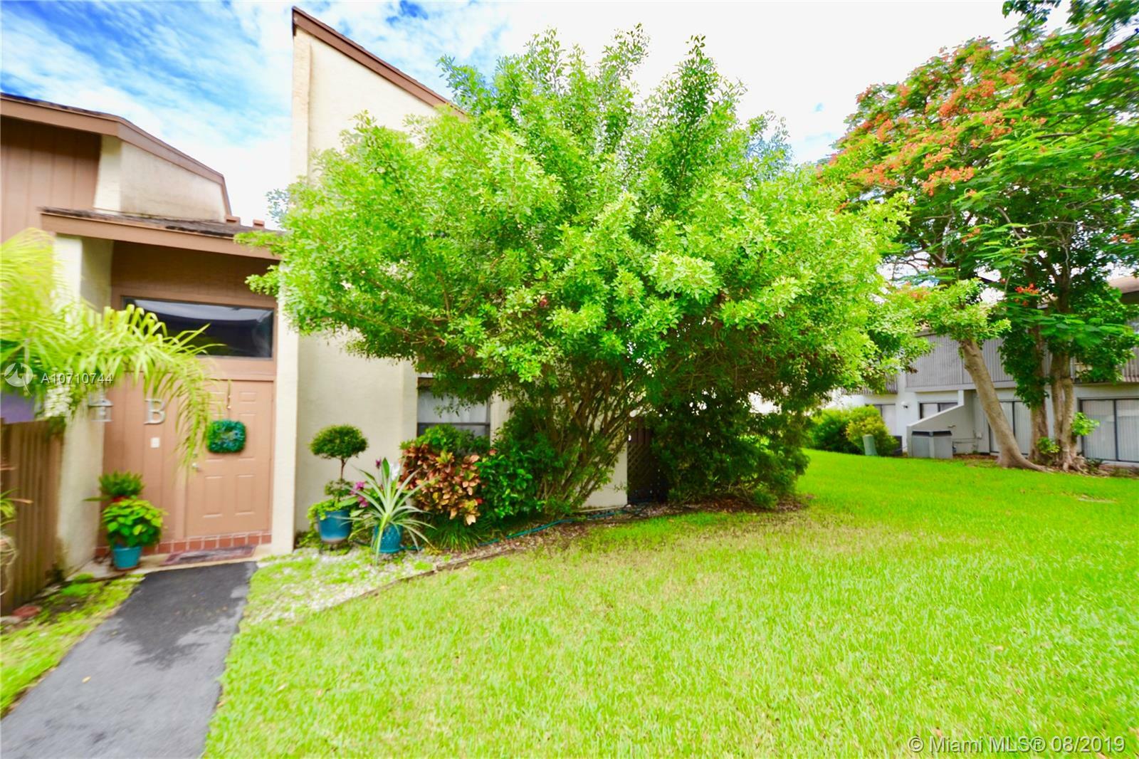 Property Photo:  10661 SW 113th Pl 94B  FL 33176 