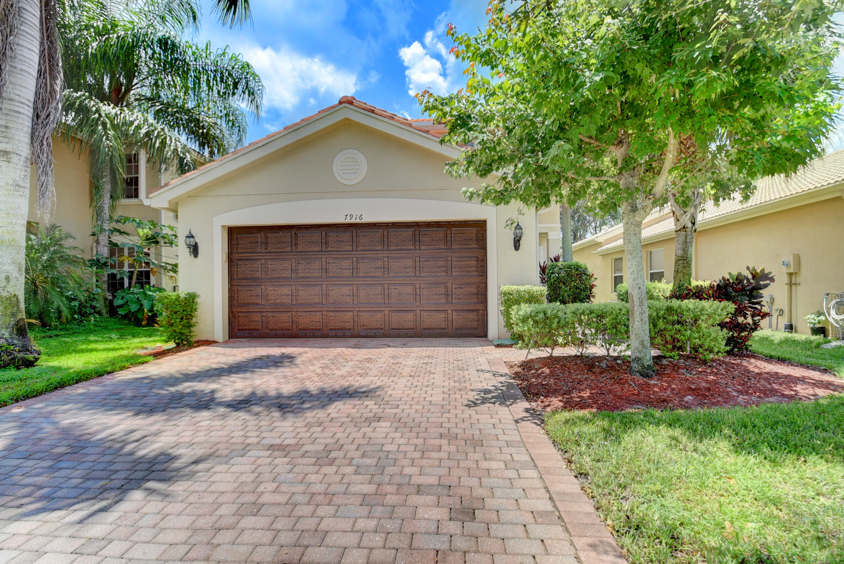 Property Photo: 7916 Red Mahogany Road FL 33437