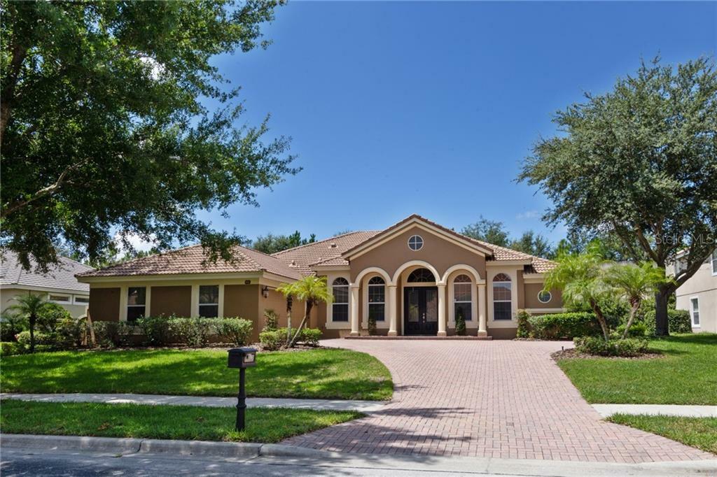 Property Photo:  7662 Saint Stephens Court  FL 32835 