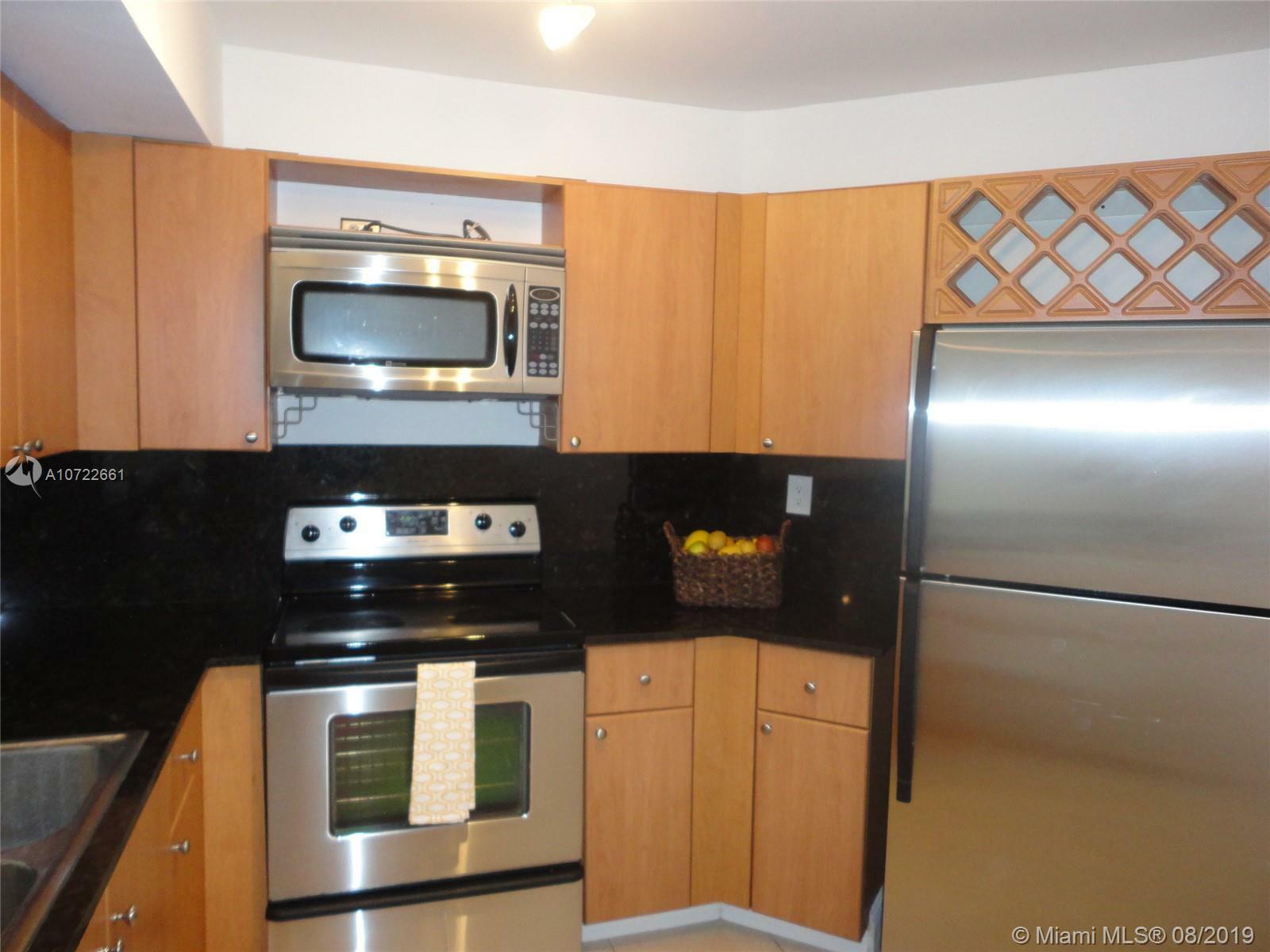 Property Photo:  9701 Fontainebleau Blvd C206  FL 33172 