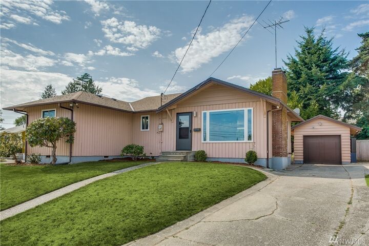 Property Photo:  10729 66th Ave S  WA 98178 