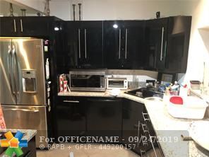 Property Photo: 832 NE 16th Pl FL 33305