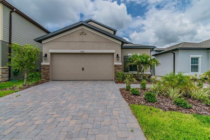 Property Photo: 10312 Berryessa Avenue FL 33578