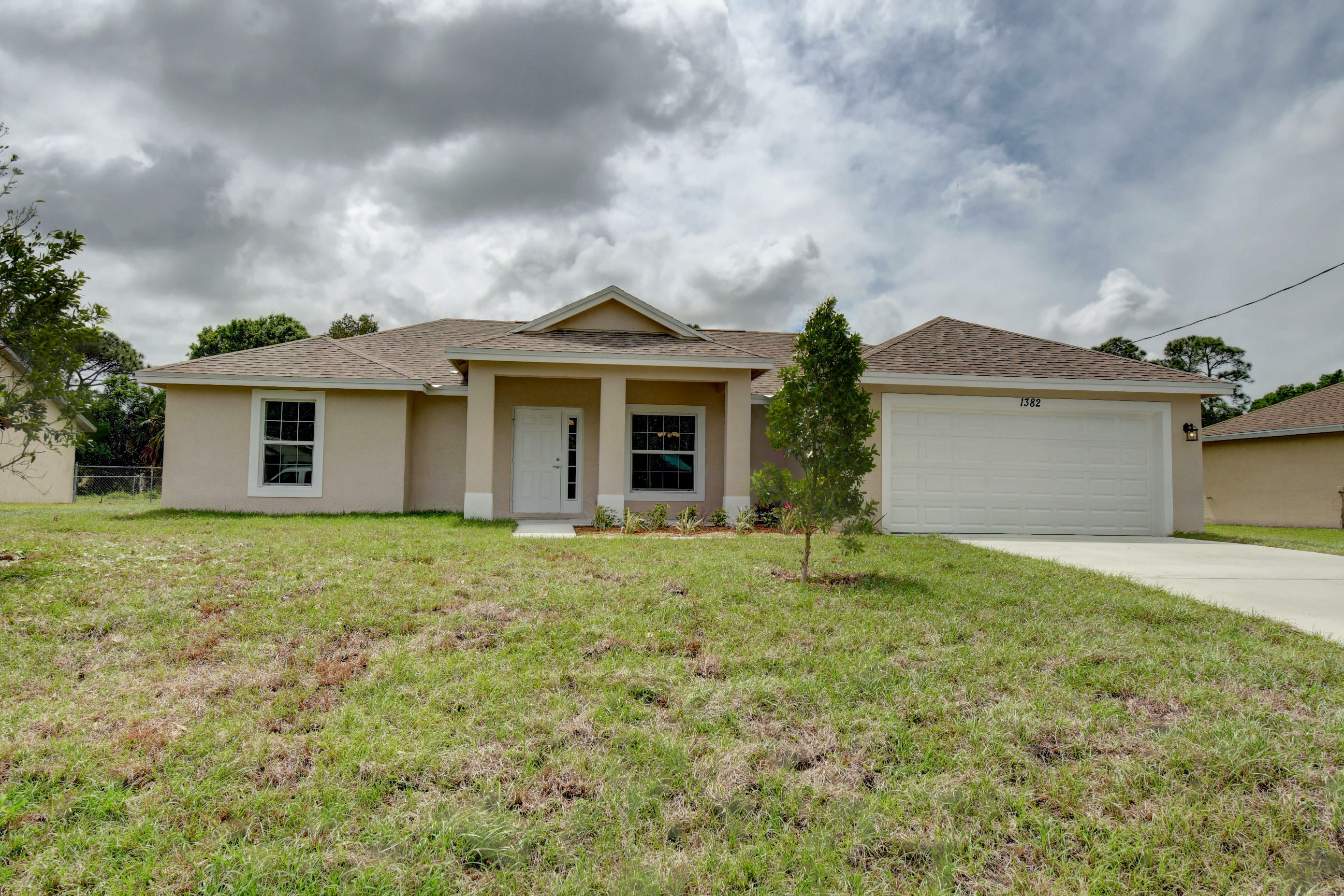 Property Photo:  1882 SW Cycle Street  FL 34953 