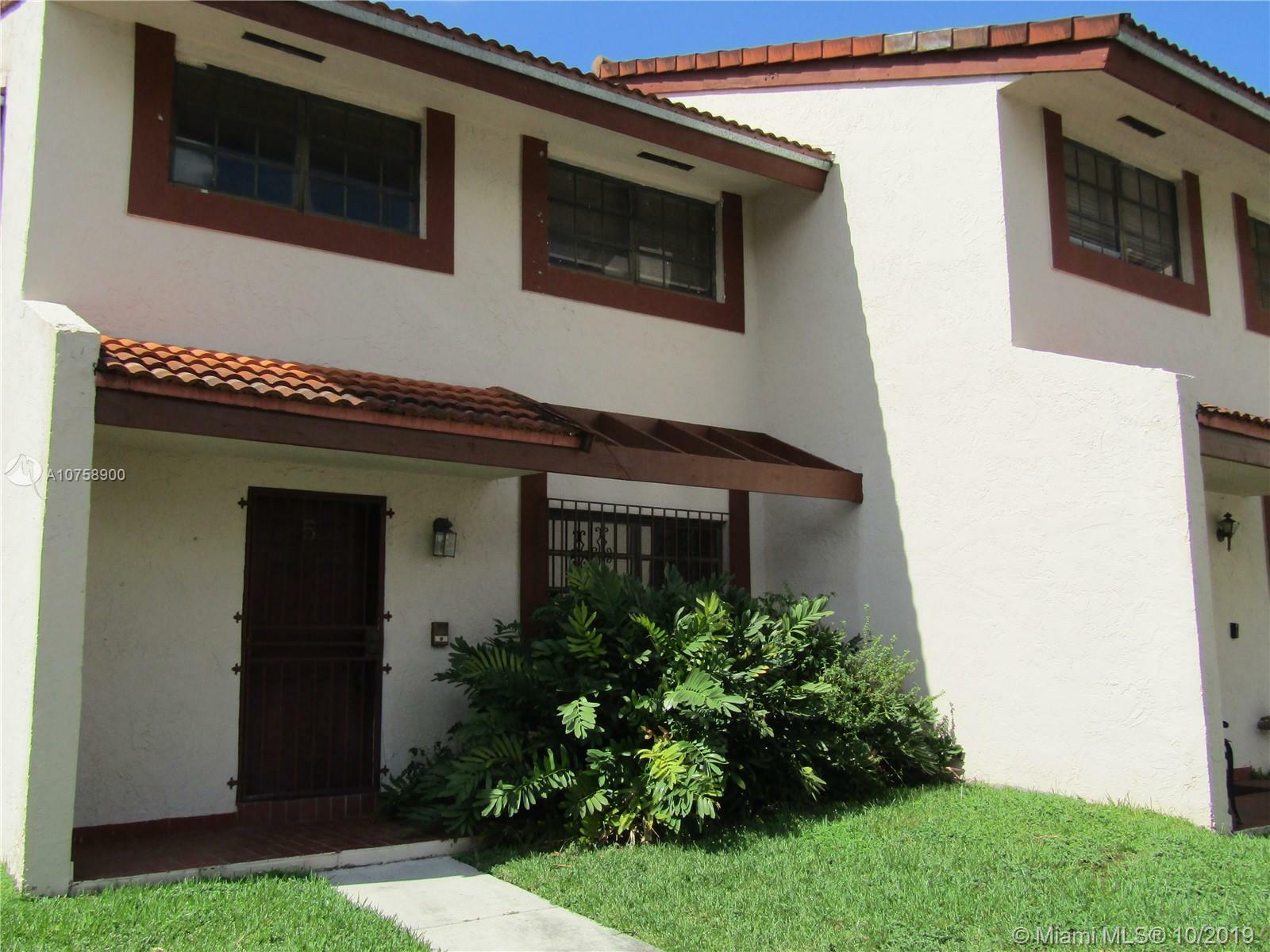 Property Photo:  5700 SW 133rd Pl 1-5  FL 33183 