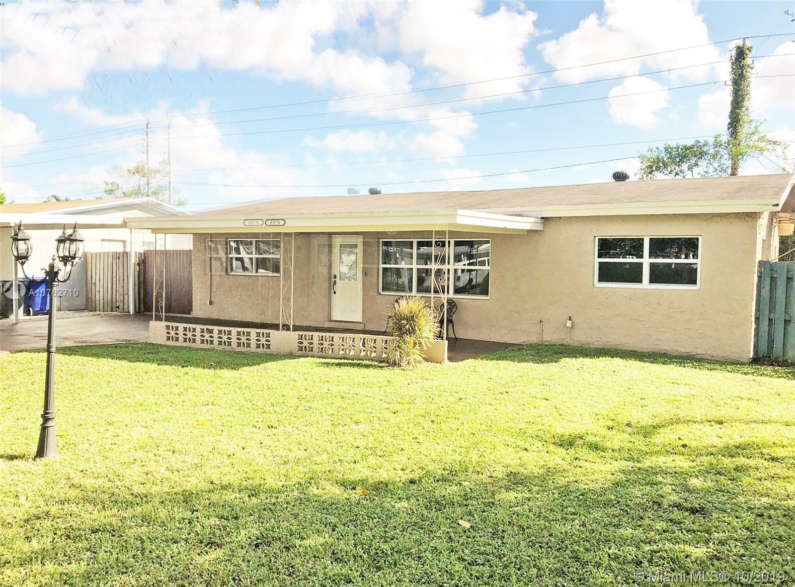 Property Photo:  6970 Thomas St  FL 33024 