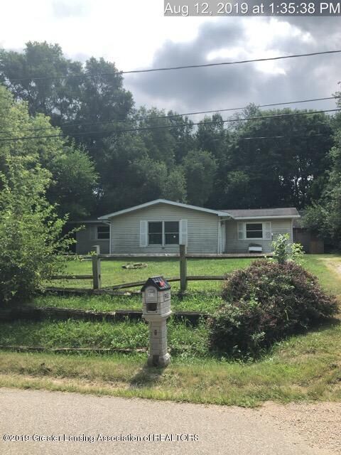 Property Photo:  903 Elmwood Street  MI 48820 