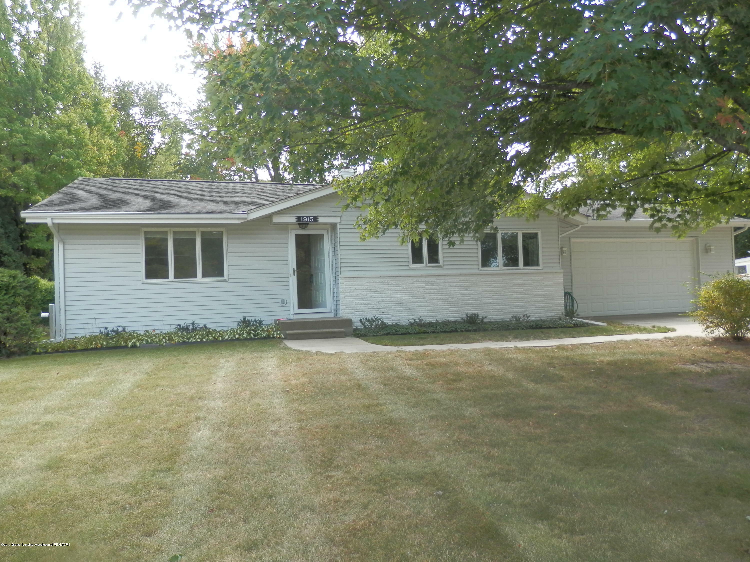 Property Photo:  1915 Haslett Road  MI 48840 