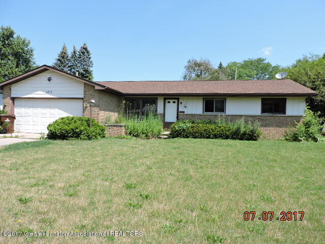 Property Photo:  5212 Birchwood Way  MI 48917 