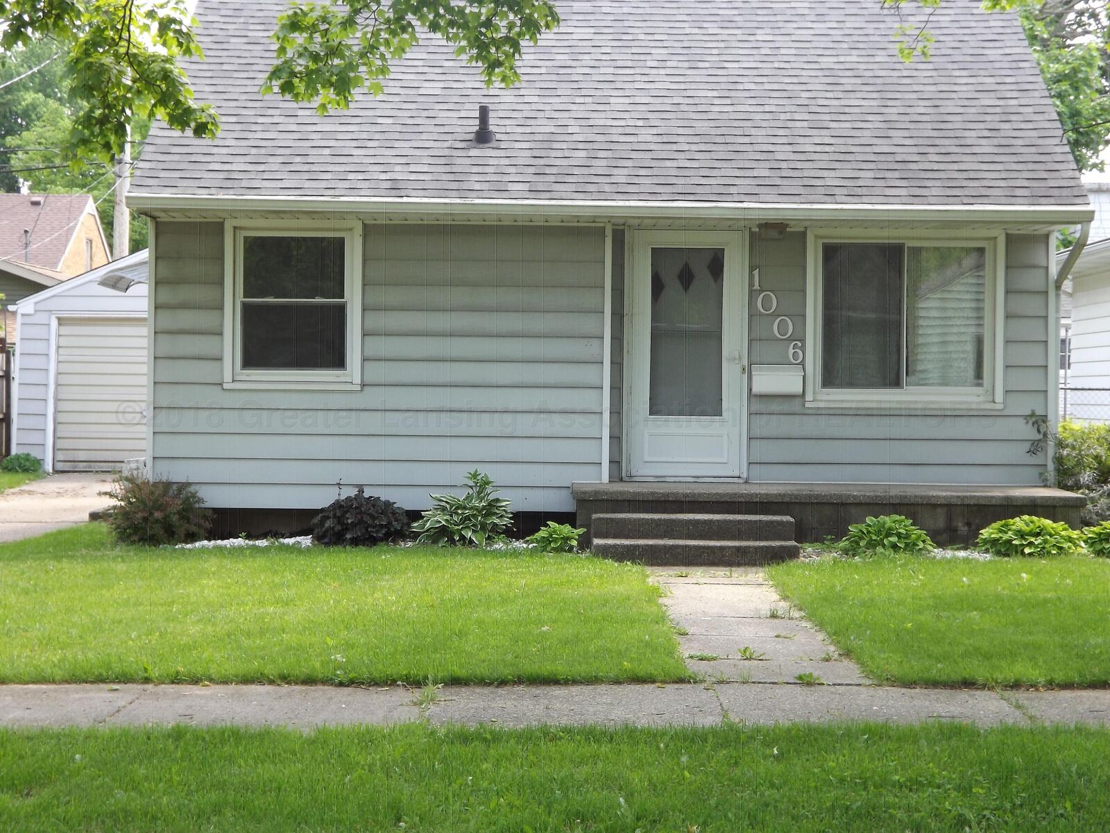 Property Photo:  1006 Durant Street  MI 48915 