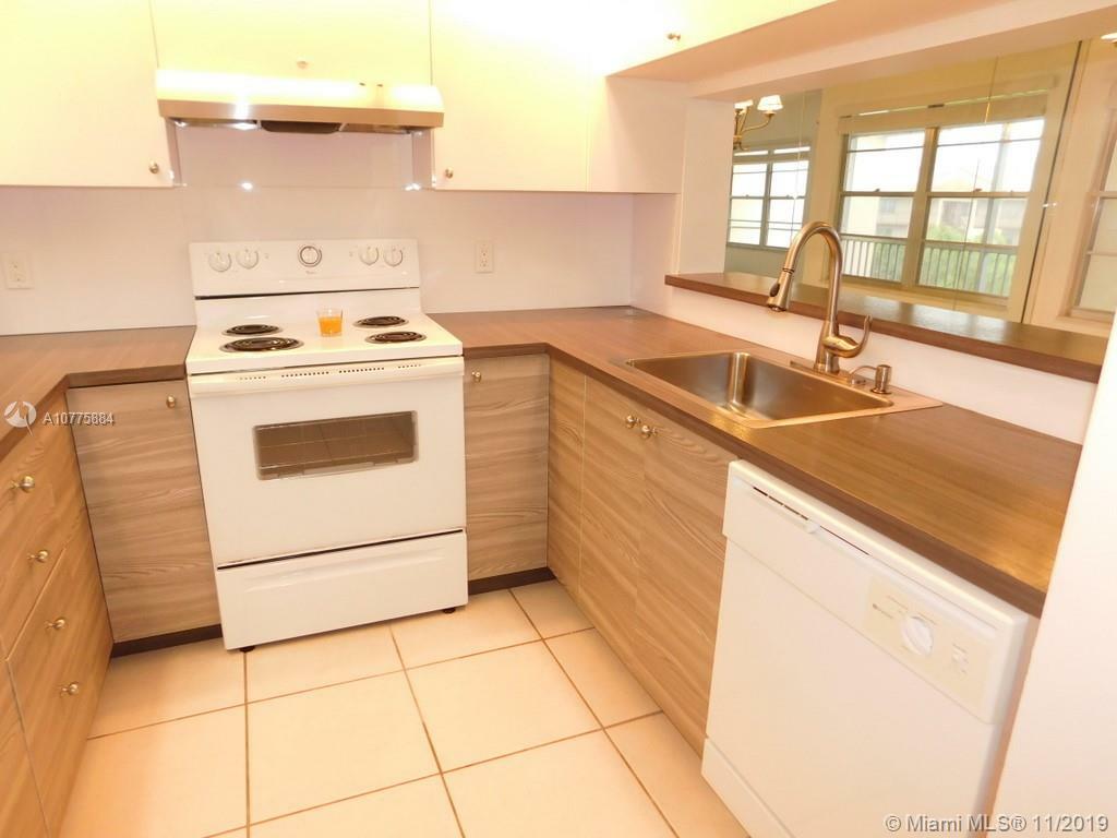 Property Photo:  12500 SW 5th Ct 403M  FL 33027 