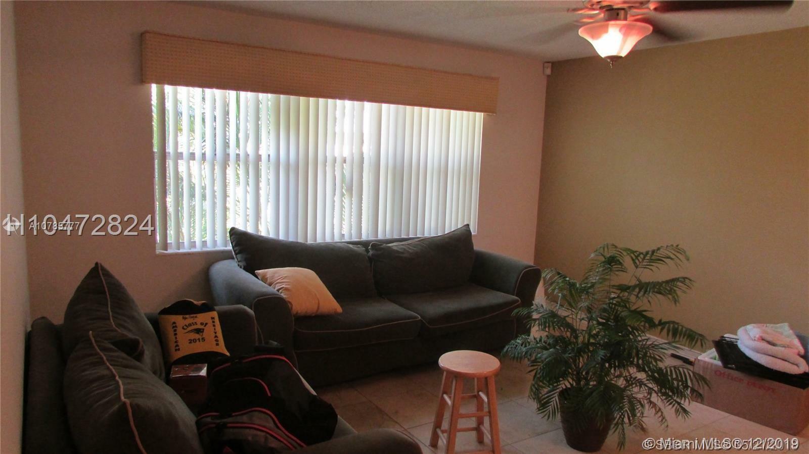 Property Photo:  550 SE 2nd Ave G25  FL 33441 