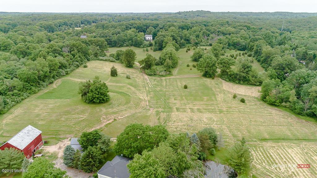 Property Photo:  7681 Cannonsburg Road NE  MI 49341 