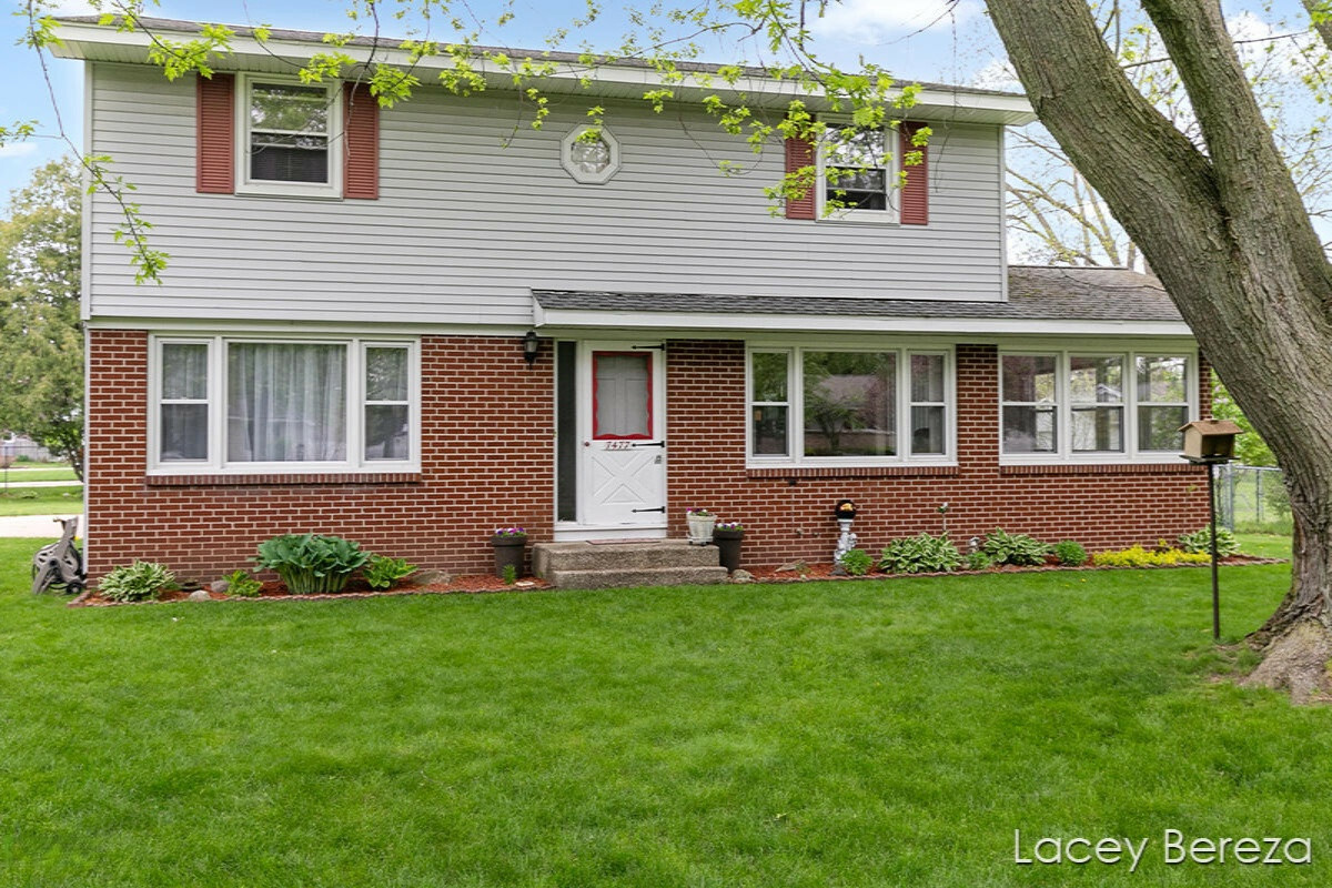 Property Photo:  7477 Westlane Avenue  MI 49428 