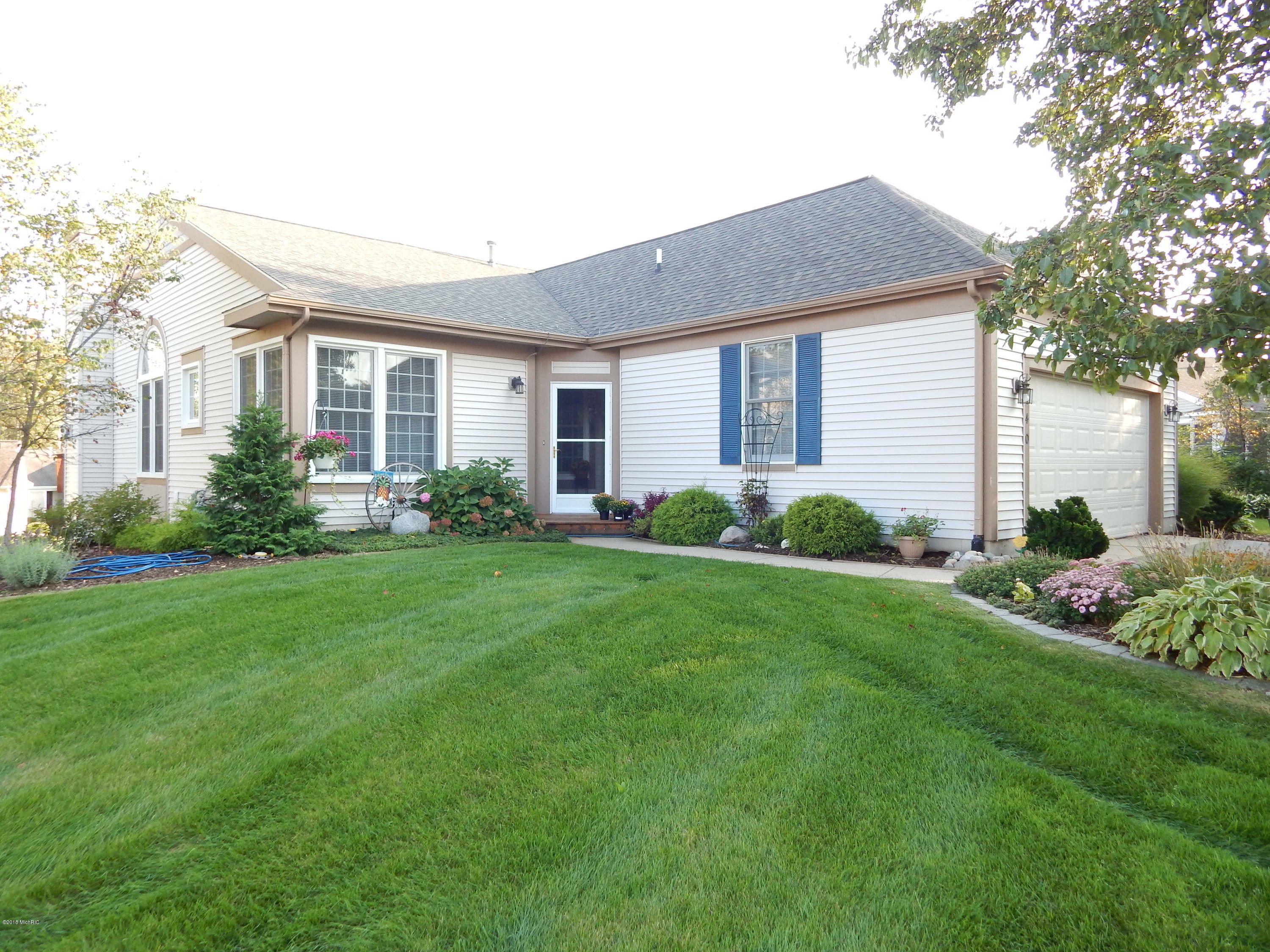 Property Photo: 1140 Highpoint Drive NW MI 49544