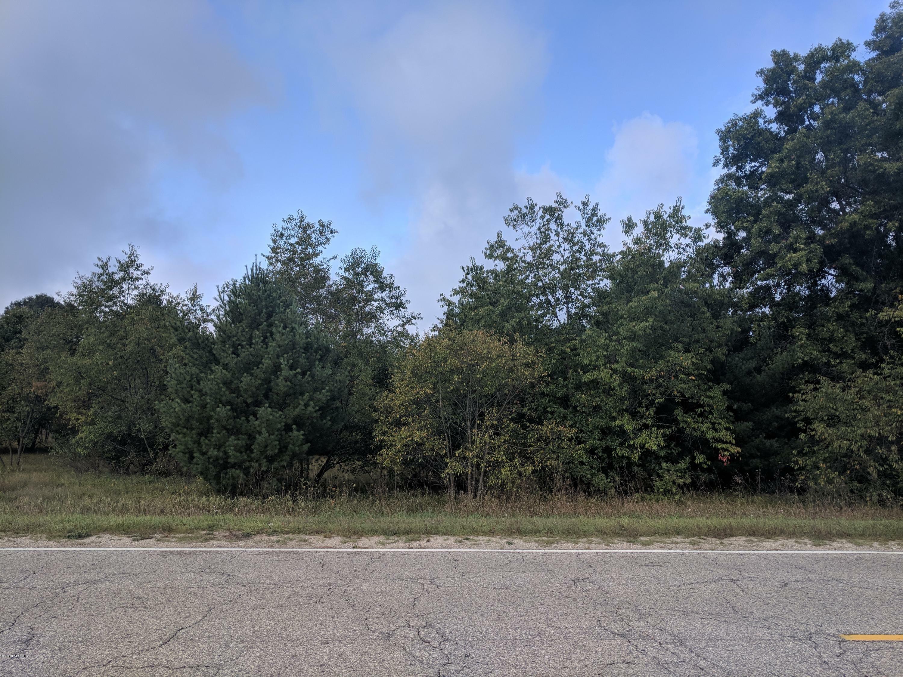 Property Photo:  4957 Newcosta Avenue  MI 49337 