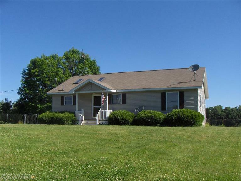 Property Photo:  7537 E 112th Street  MI 49329 
