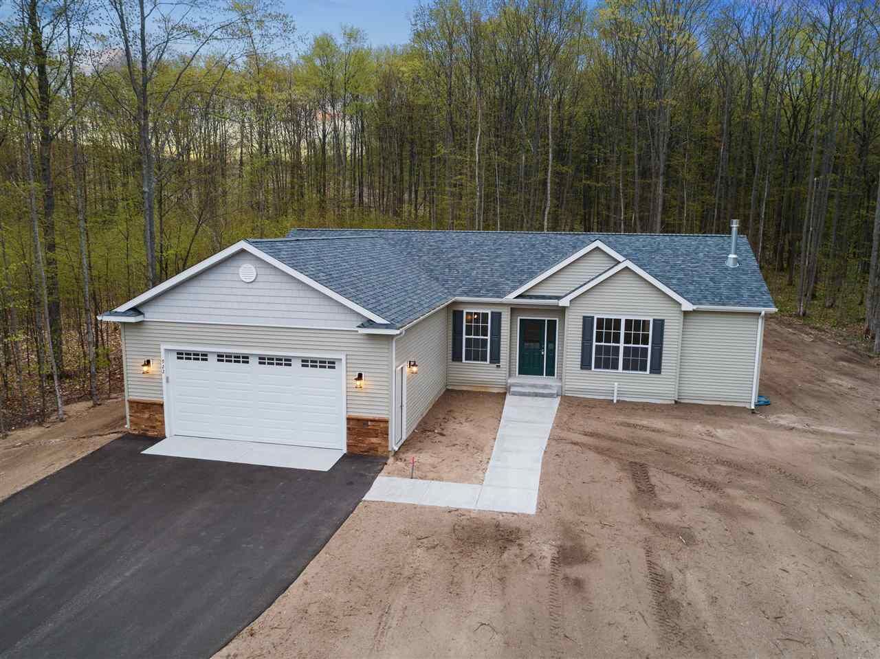 Property Photo: 922 Windsong Place Lot 30 MI 49770