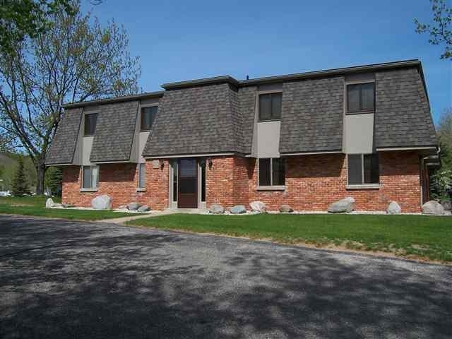 Property Photo: 915 Robinson Unit 13 MI 49712