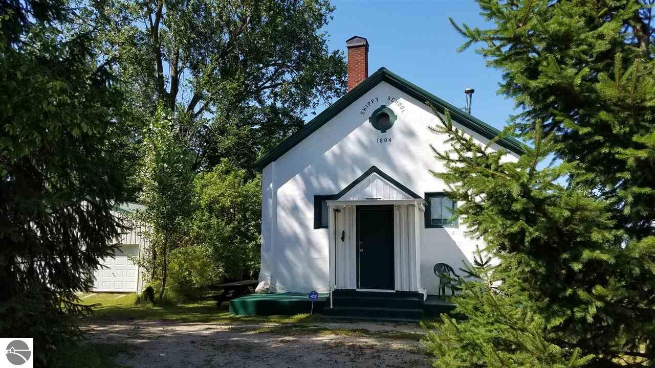 Property Photo:  9980 W Rhoby Road  MI 49663 