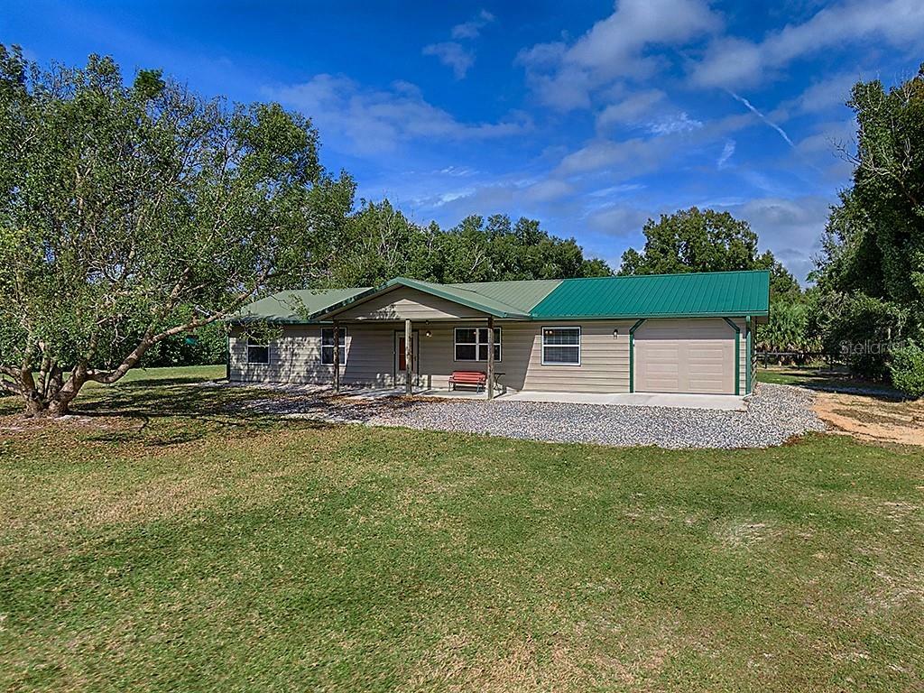 Property Photo:  10853 S Em En El Grove Road  FL 34788 