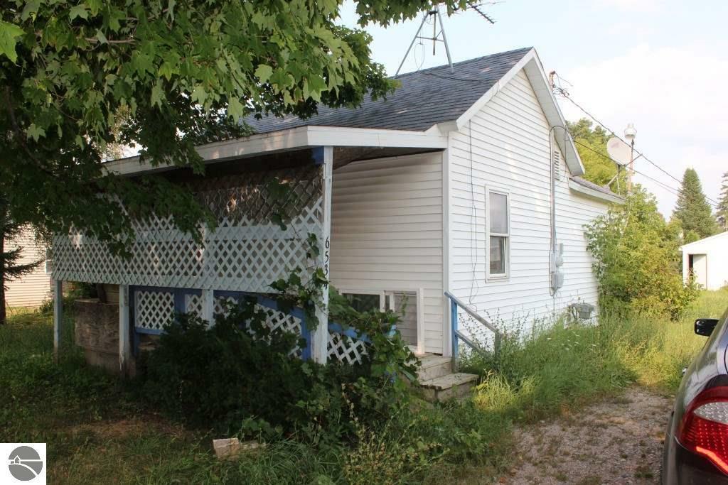 Property Photo:  6534 Hillsinger Street  MI 48832 