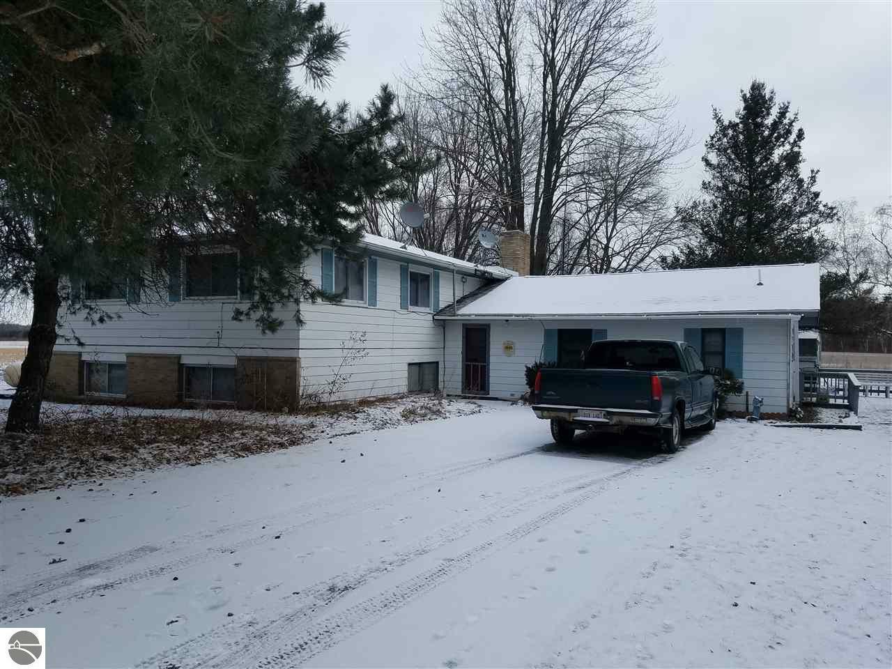 Property Photo:  7490 N Leaton Road  MI 48617 