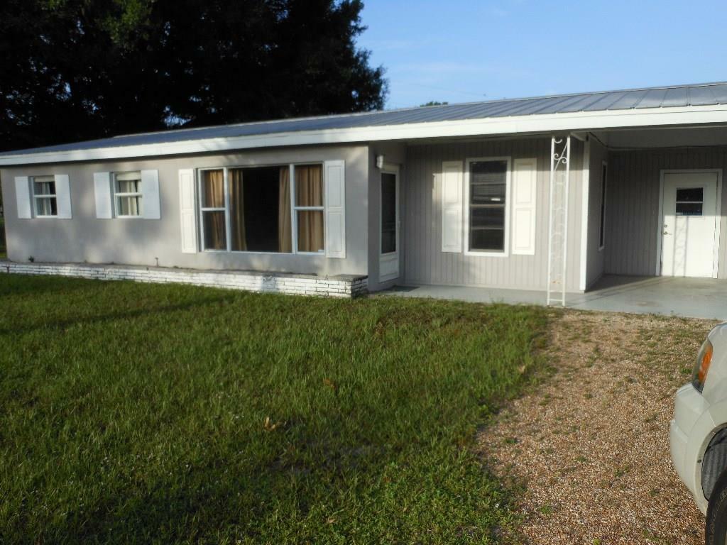 Property Photo: 7701 Pacific Avenue FL 34951