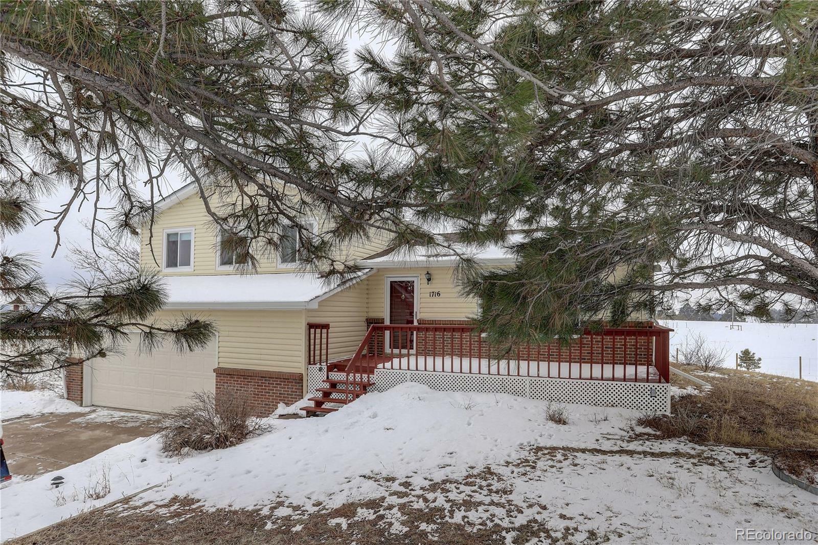 Property Photo:  1716 Shoshone Trail  CO 80107 