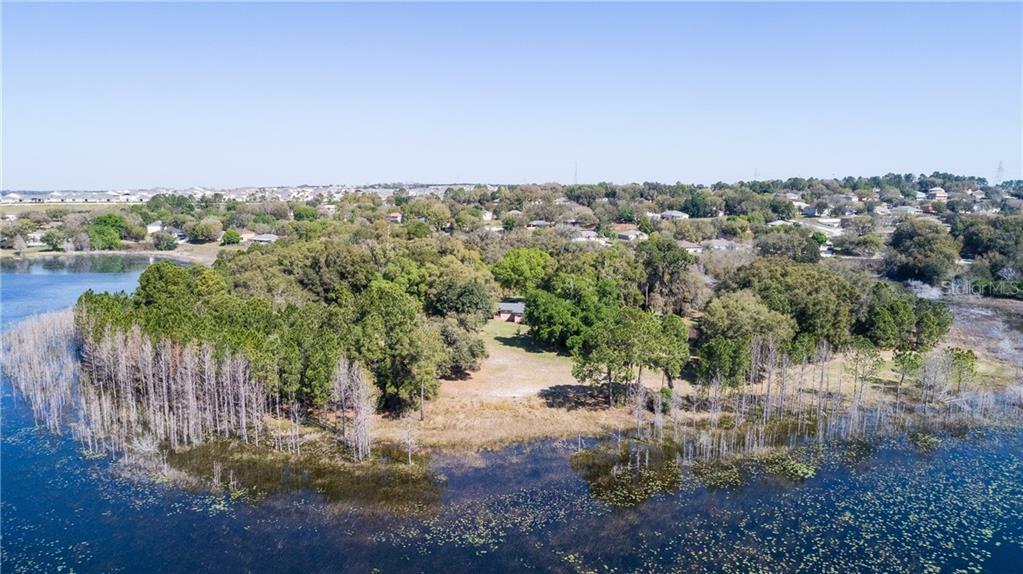 Property Photo:  999 E Plum Lake Lane  FL 34715 