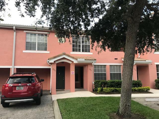 Property Photo:  106 SW Peacock Boulevard 4-205  FL 34986 