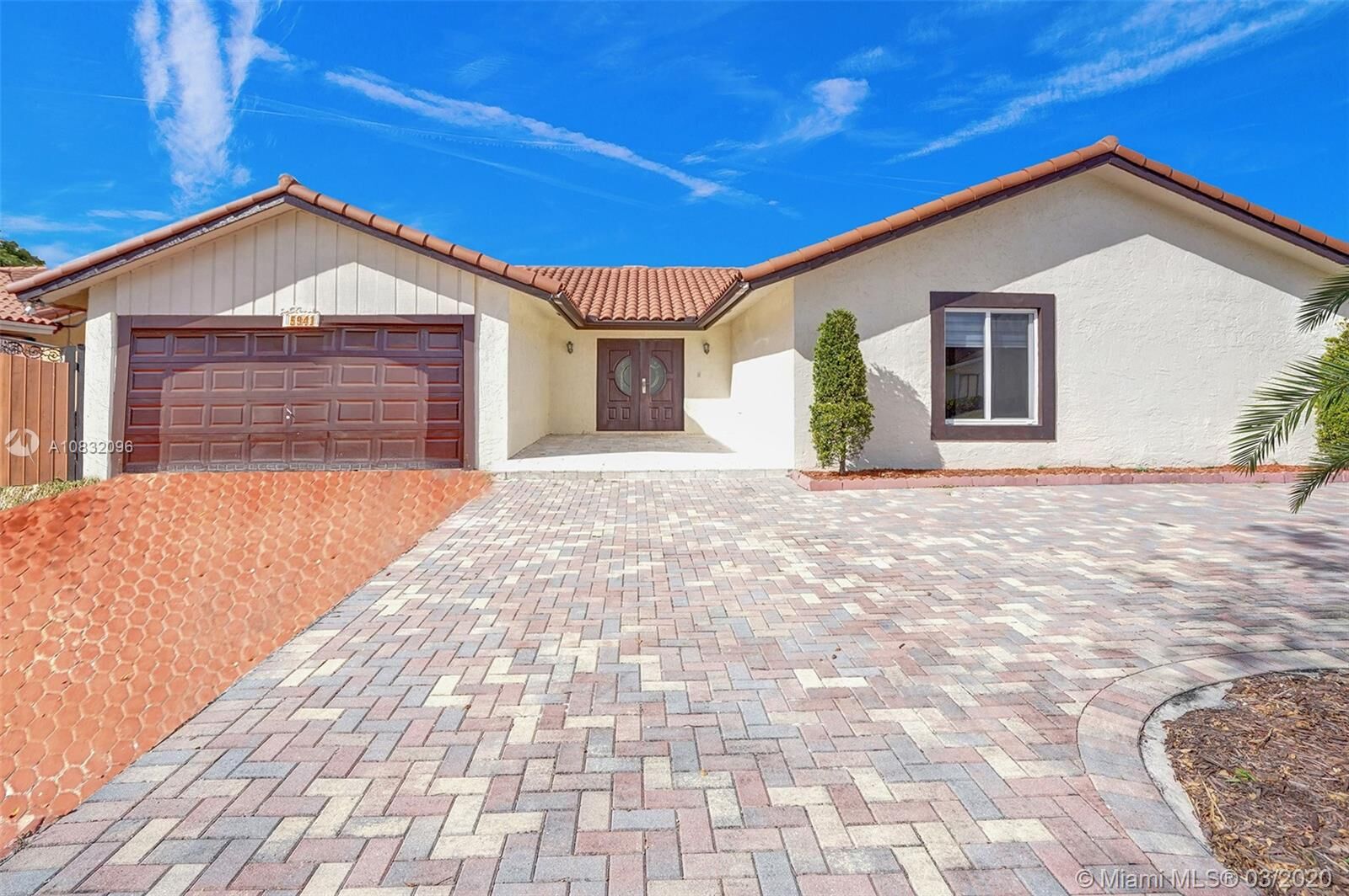 Property Photo: 5941 NW 201st St FL 33015