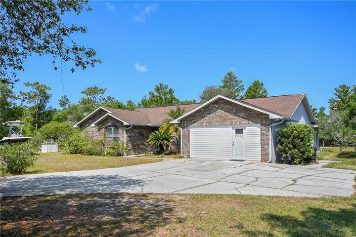 Property Photo:  7065 Ranchero Court  FL 34771 