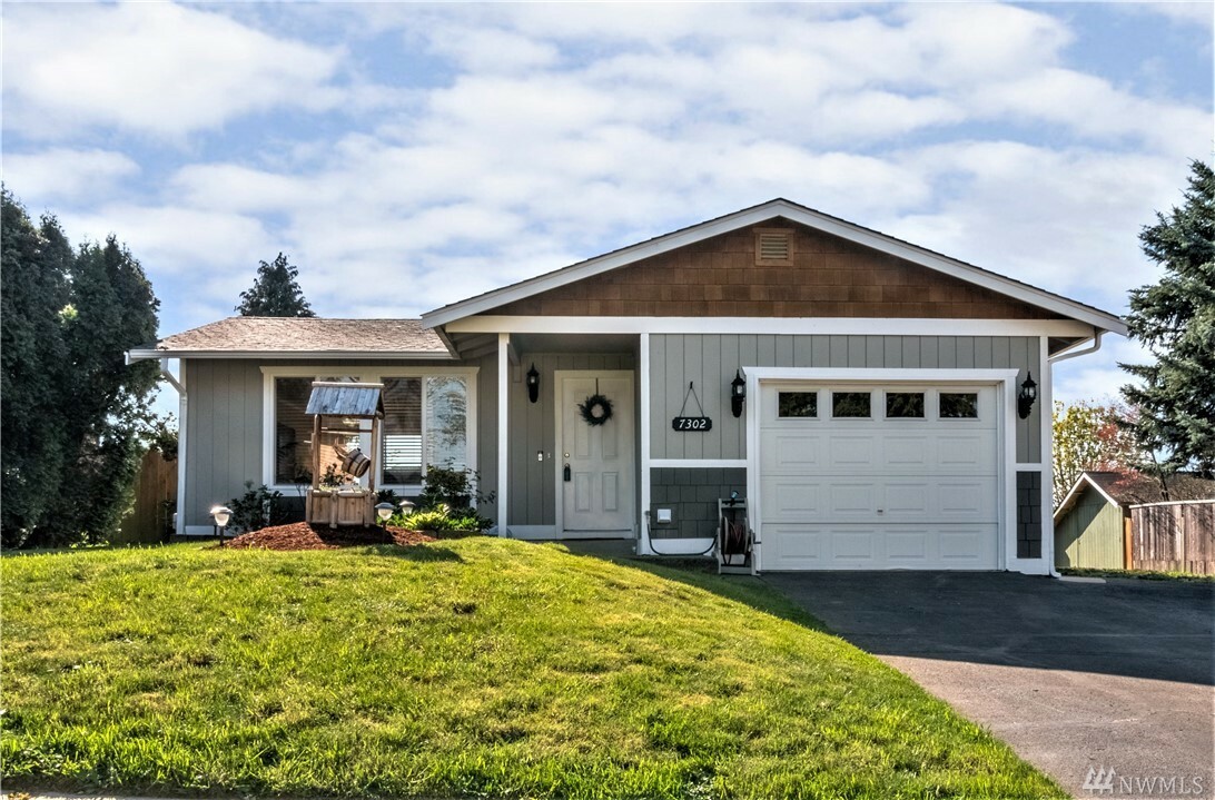Property Photo: 7302 S Ainsworth Ave WA 98408