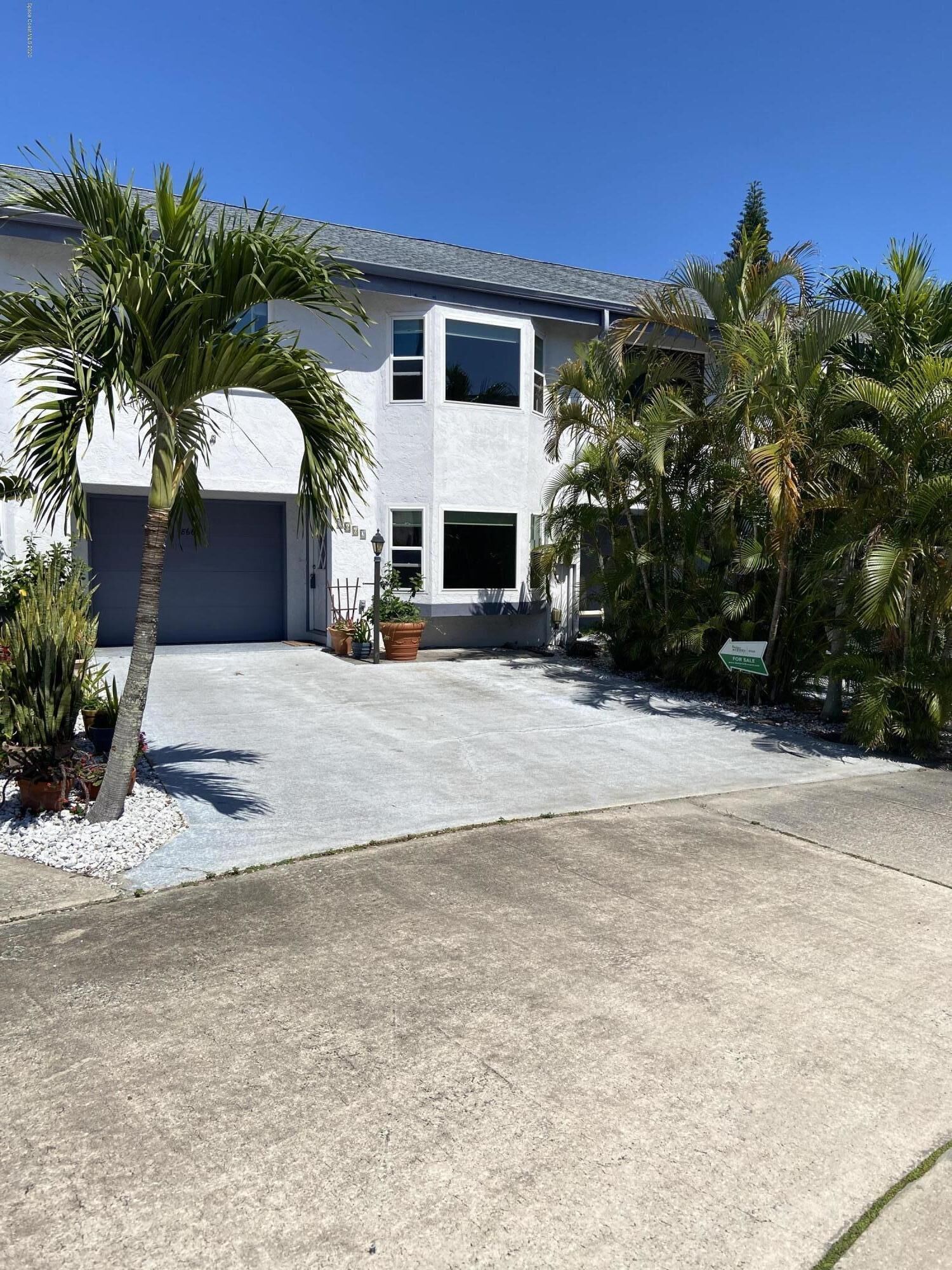 Property Photo: 8662 N Atlantic Avenue FL 32920