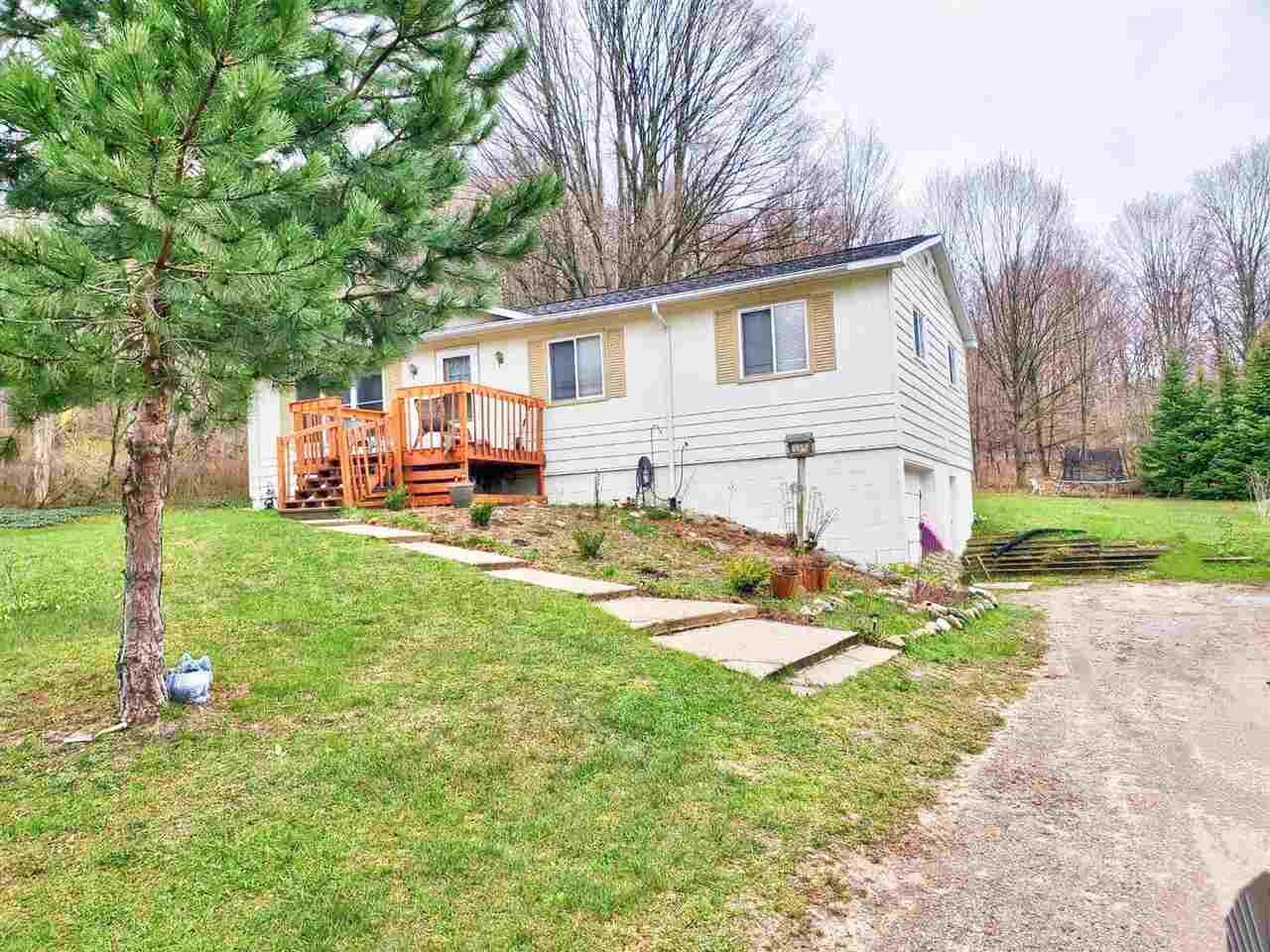 Property Photo:  1438 Pleasant  MI 49712 