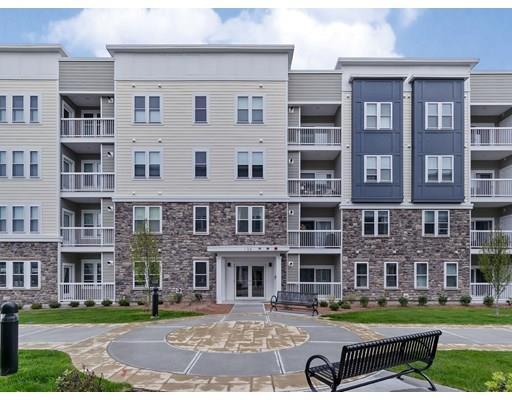 Property Photo: 130 University Ave 1211 MA 02090