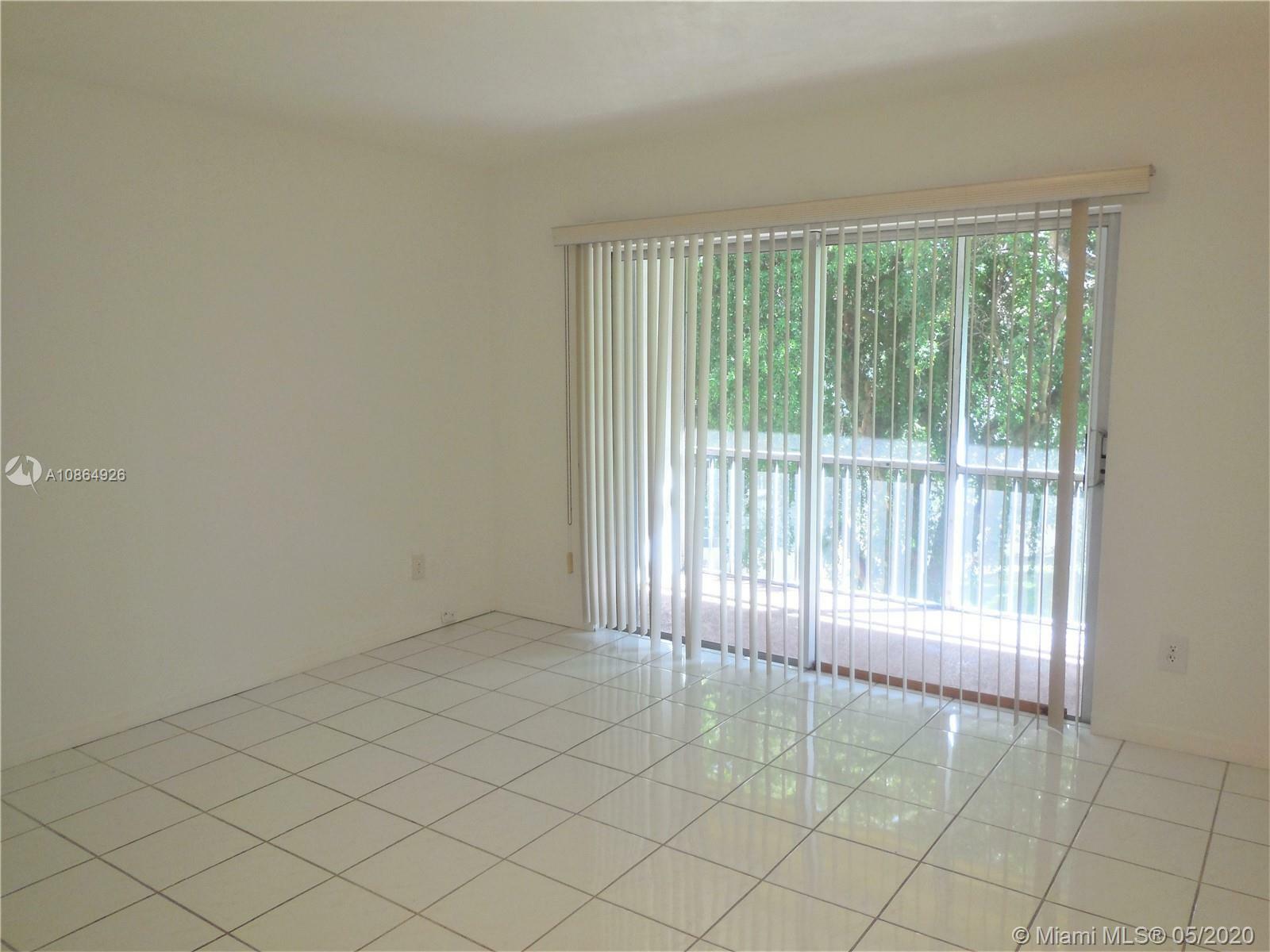 Property Photo:  1540 NE 191st St 304  FL 33179 