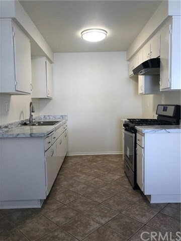 Property Photo:  410 21st Street B  CA 92648 