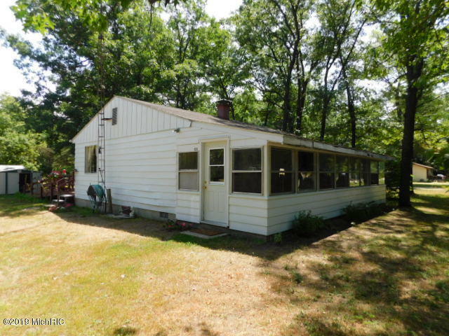 Property Photo:  4139 N High Bridge Road  MI 49619 