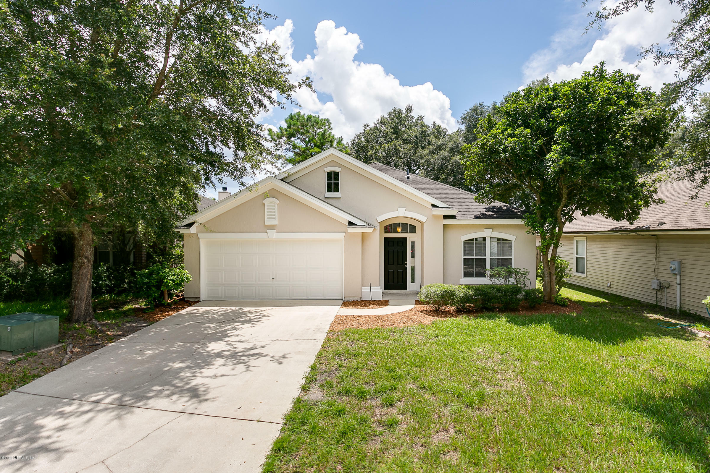 Property Photo:  1736 Canopy Oaks Drive  FL 32065 