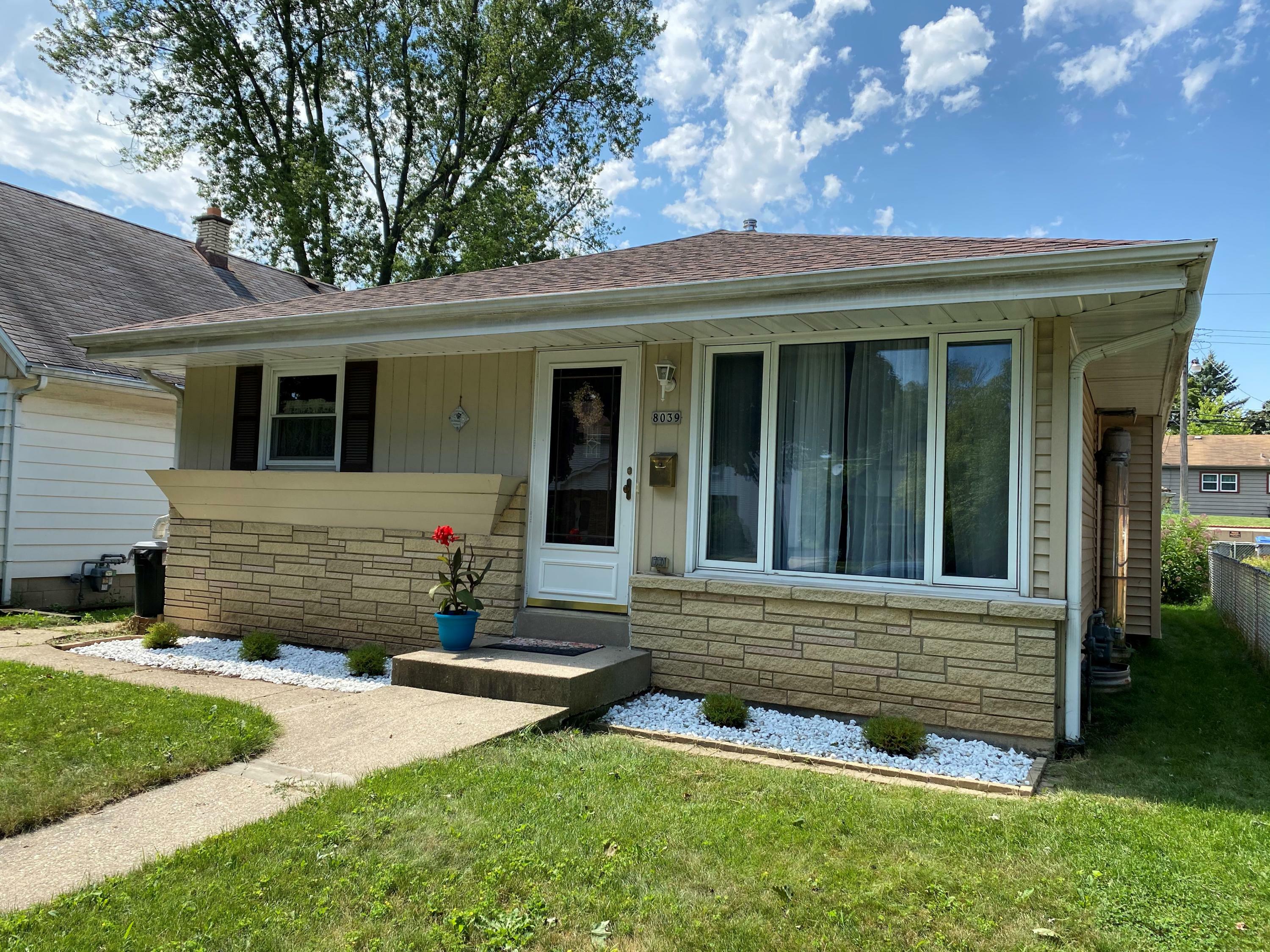 Property Photo: 8039 W Potomac Ave WI 53218