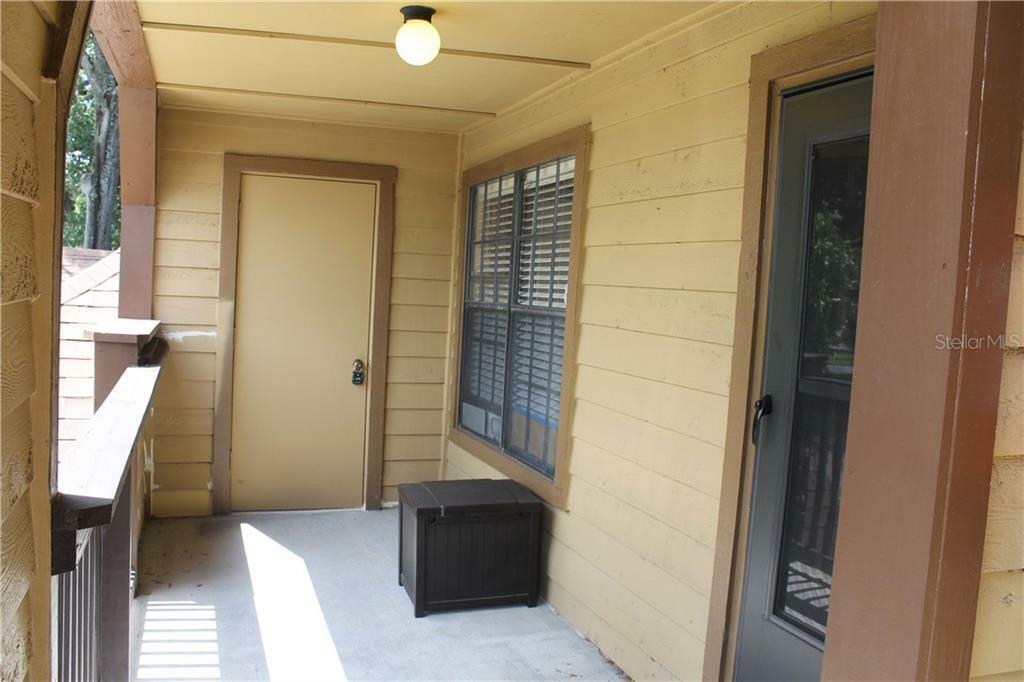 Property Photo:  320 Black Oak Court 206  FL 32701 